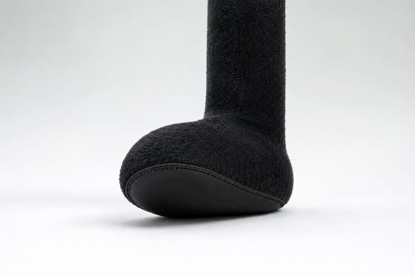 Close-up of terry's foot, showing the cactus leather sole
